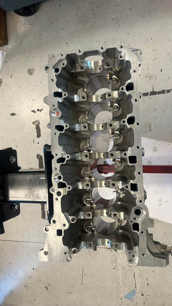Bare S58 cylinder head after cleaning and inspection