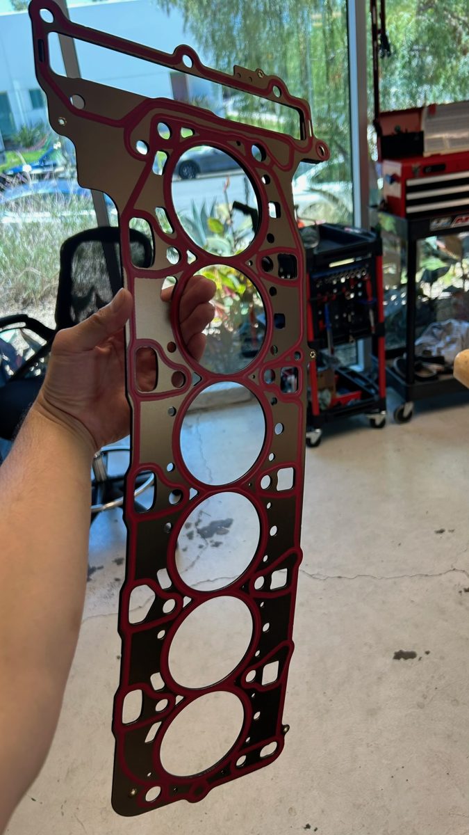 Multi-layer steel head gasket for the S58 engine