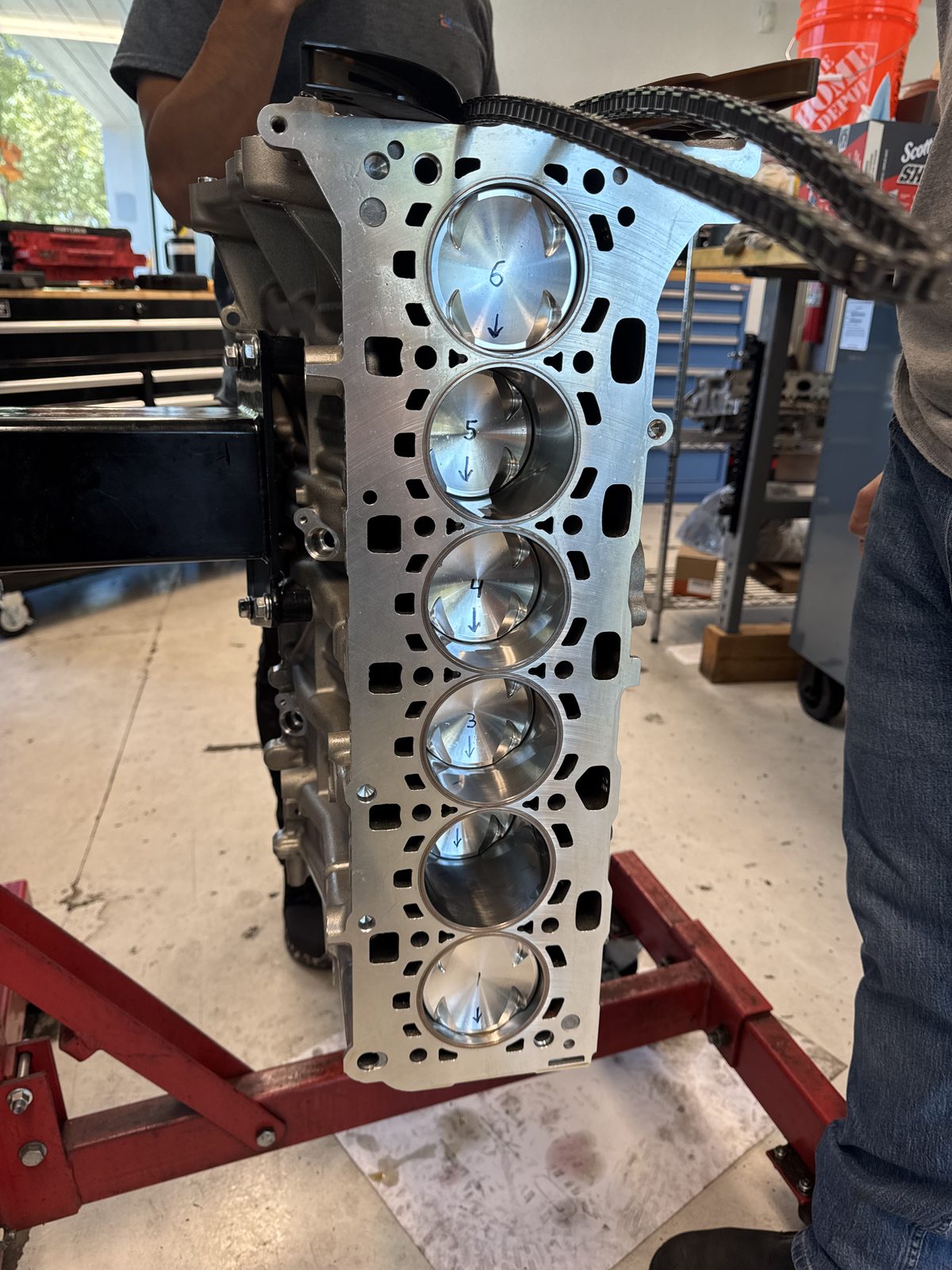All six pistons installed in the block