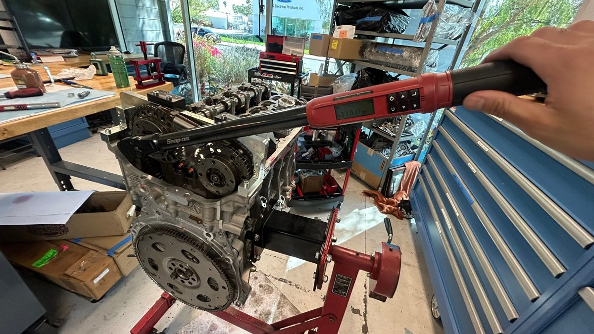 Digital torque wrench recording fastener torque during S58 assembly