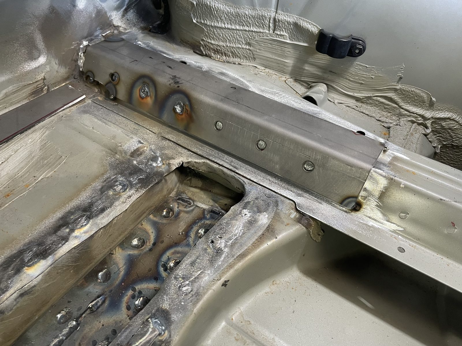 Randy Forbes reinforcement plate welded along the BMW Z3 rear floor rail